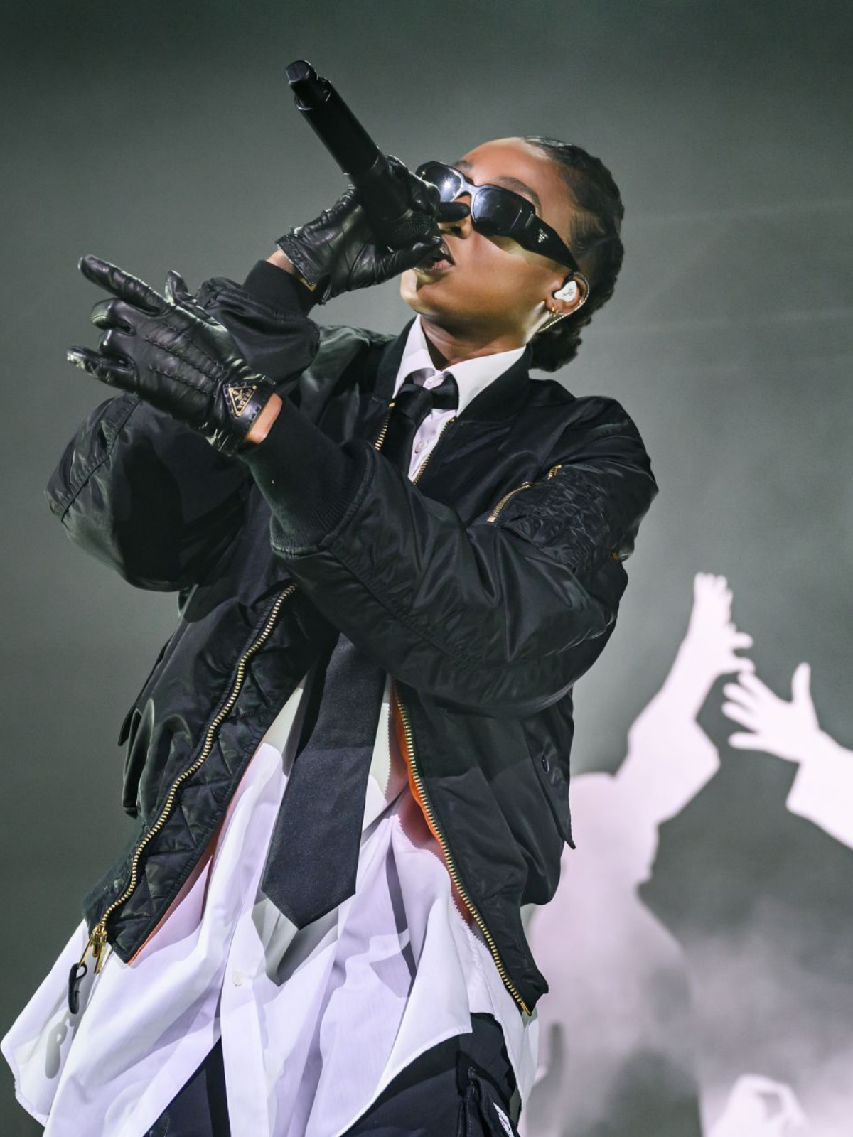 Little Simz wearing Cosmic Ears CIEMs on stage mobile homepage image